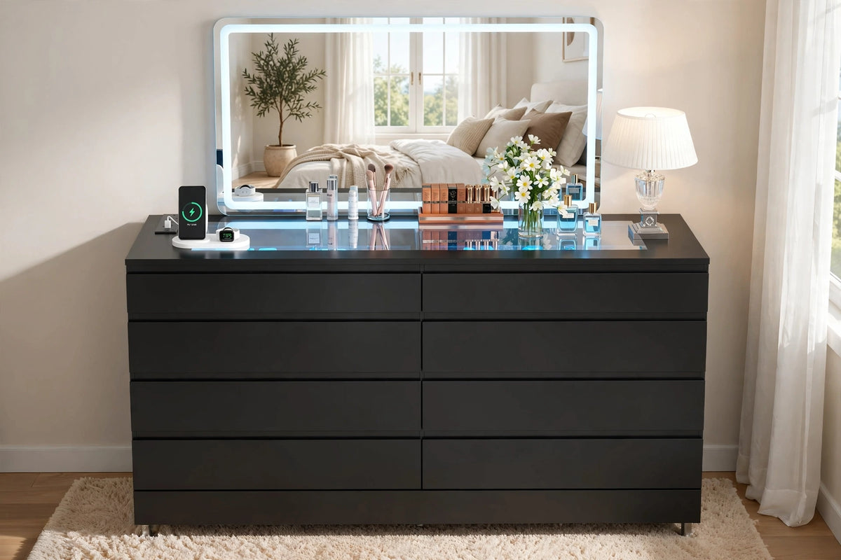 Black 8-drawer double dresser with LED glass top and wireless charger in bright sunlit bedroom with large mirror